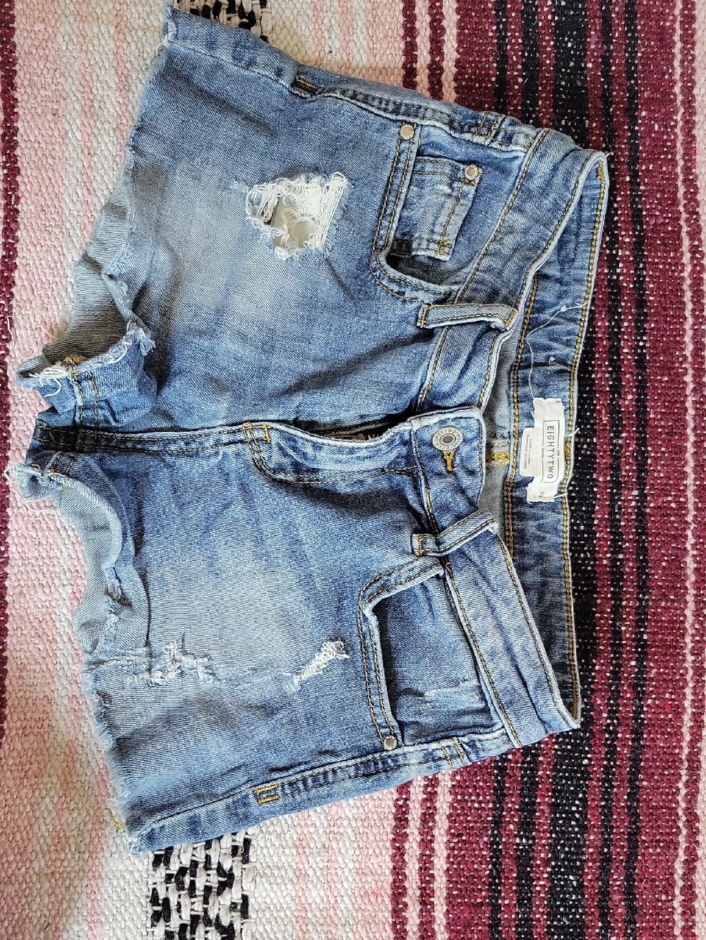Levi's Light Blue Distressed Denim Cutoff Shorts